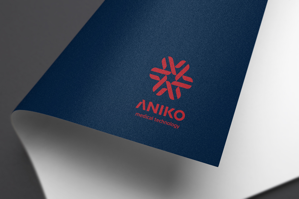 Вертикальный логотип компании ANIKO. Печать